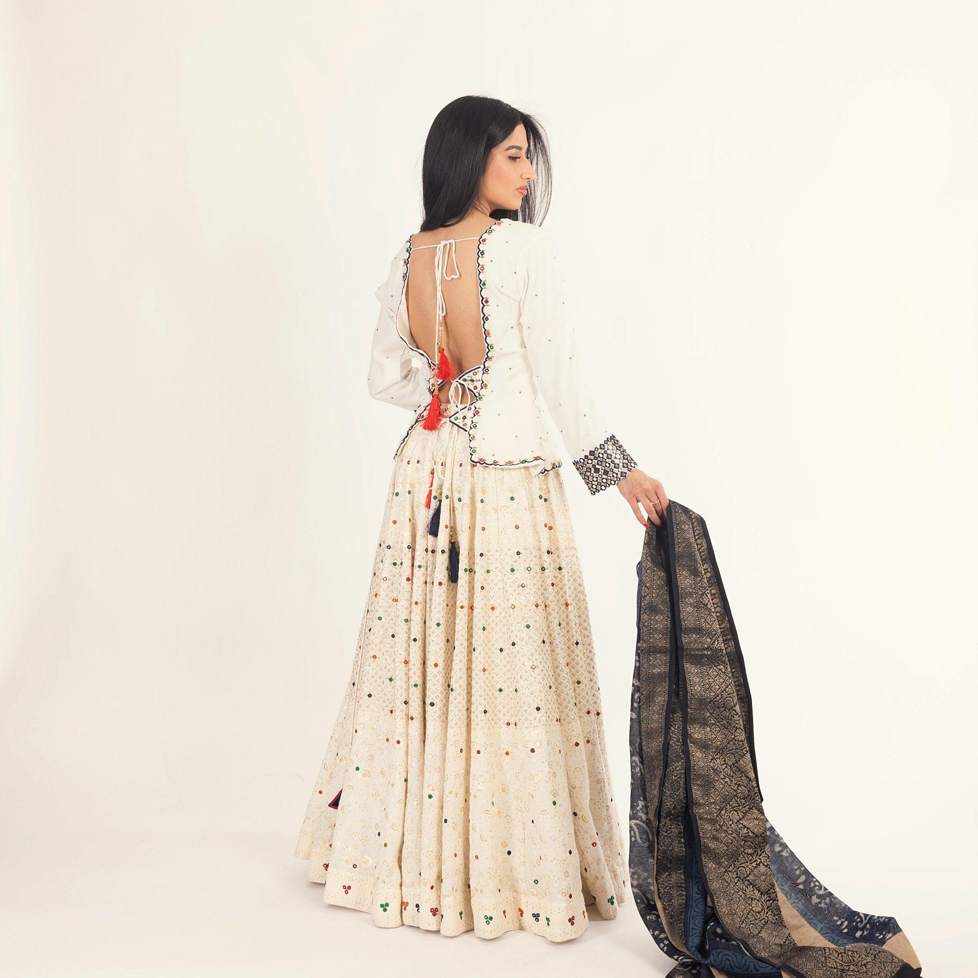 White Lehenga Choli Set with Heavy Embroidery - Image 2