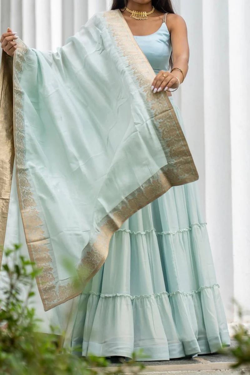 Sky Blue Shimmer Tiered Lehenga Choli with Gold Accents for Women - Image 3
