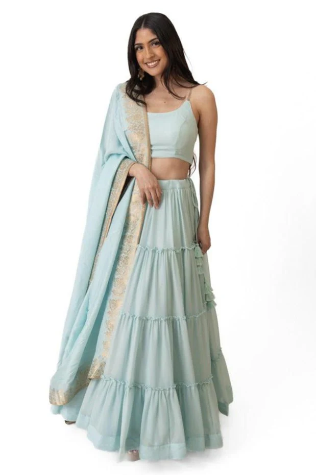 Sky Blue Shimmer Tiered Lehenga Choli with Gold Accents for Women - Image 4