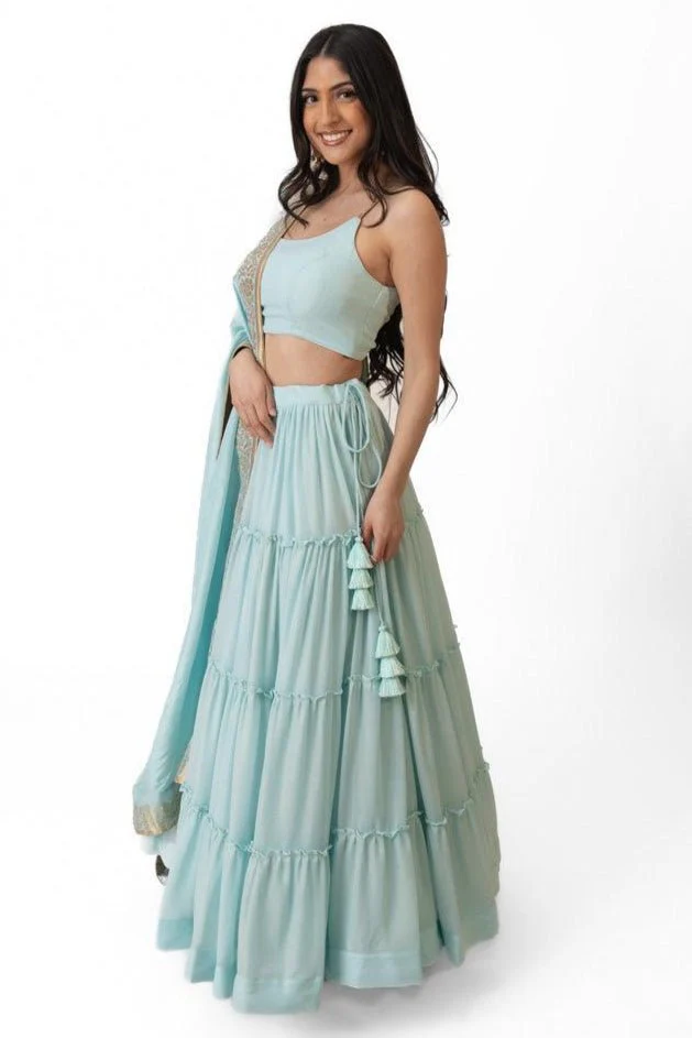 Sky Blue Shimmer Tiered Lehenga Choli with Gold Accents for Women - Image 7